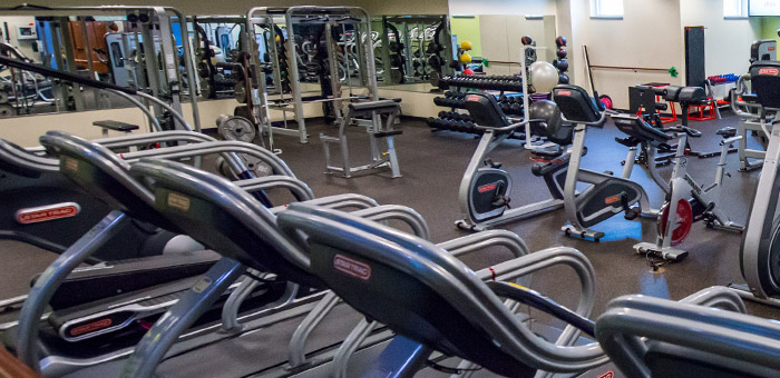 Compassion gym interior with workout equipment