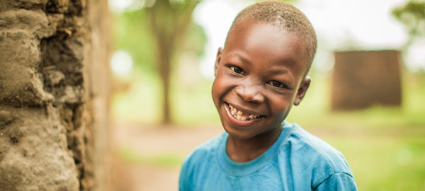 A young compassion sponsored boy smiling